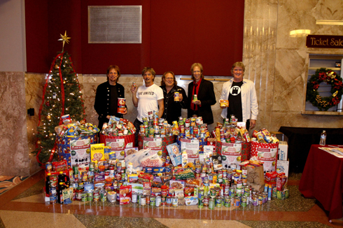 Food Bank of Monterey County workers and the December People grabbing a quick picture with some of the donation barrels after the show.  December People always strives to link each show to a charity.  In Monterey's case it's the county food bank and the Santa Cruz County Animal Shelter.